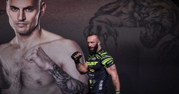 Who won the Dawid “Crazy” Załęcki vs. Michał “Matrix” Królik fight during Fame MMA 31?
